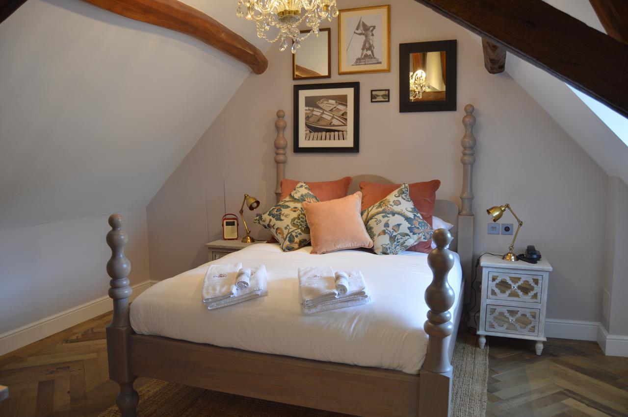 Logis Hotel De France La Chartre-sur-le-Loir Buitenkant foto