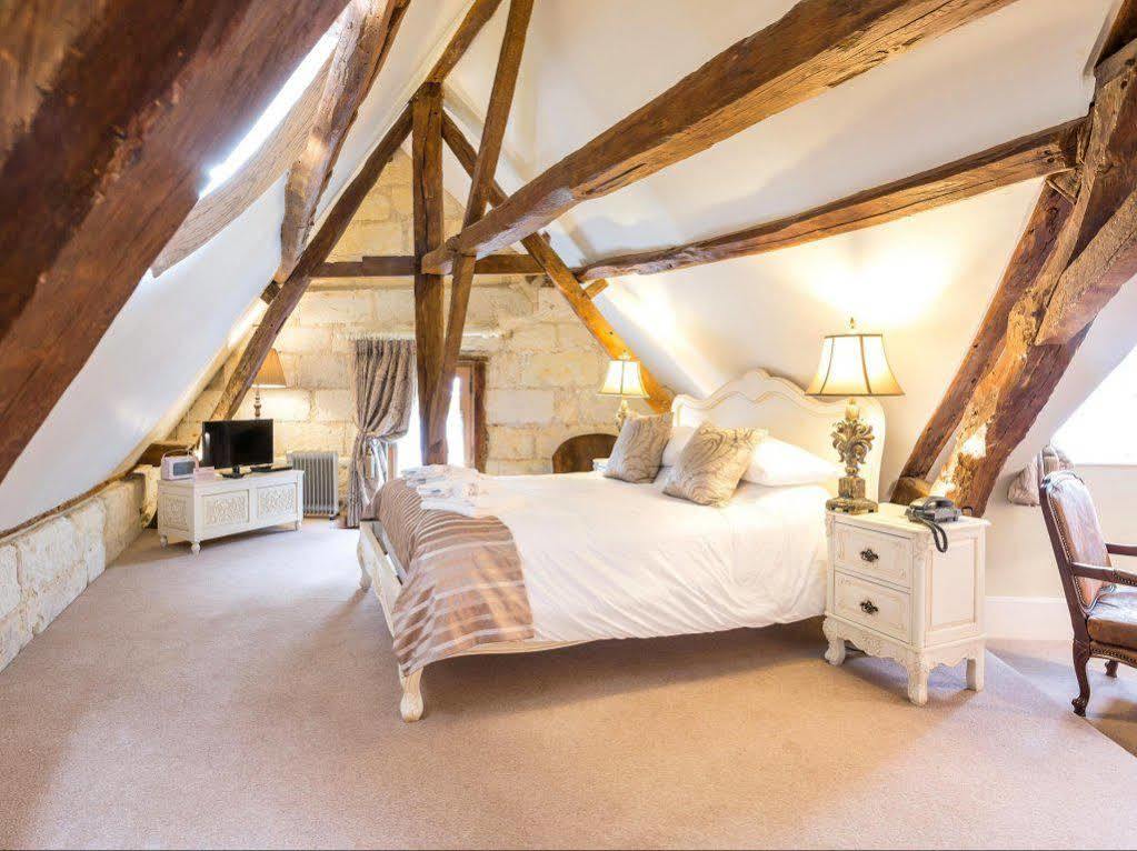 Logis Hotel De France La Chartre-sur-le-Loir Buitenkant foto