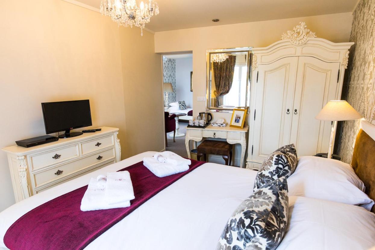 Logis Hotel De France La Chartre-sur-le-Loir Buitenkant foto